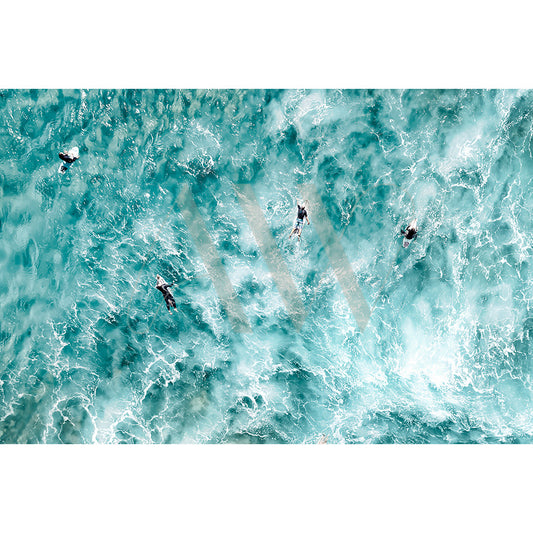 The Cabarita Beach Drone Image 0306 by AWP Image Library captures an aerial view of people swimming in a clear turquoise ocean, surrounded by foamy waves, with the sun shimmering on the vibrant blue water.